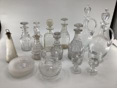 Quantity of decanters, pair of claret jugs, and a frosted glass small corked vase, engraved