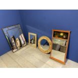 Four modern wall mirrors, to include a large bamboo style rectangular wall mirror, a circular wall