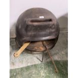 Free standing Pizza oven, in used/weathered condition, and a freestanding metal tripod cooking