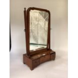 Mahogany dressing table swing mirror and three drawers to base