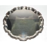 Joe Mercer. A large silver plated salver, with three scrolled feet, presented to Joe Mercer by '