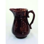 Cricket jug. An attractive brown mid 19th century Staffordshire salt-glaze jug with strap handle