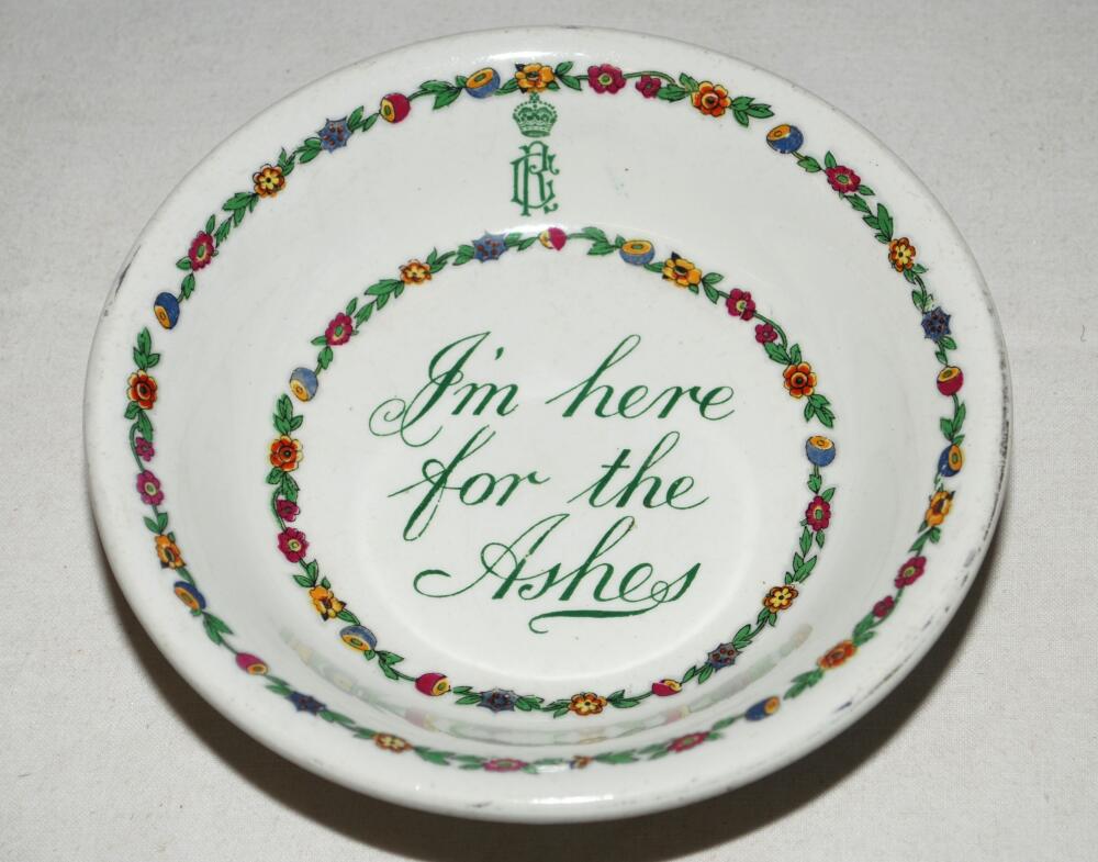 'I'm Here For The Ashes' 1926. Rare and unusual dish, early 20th century, with centre inscription in