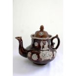 Measham Ware cricket teapot. A Victorian saltglaze stoneware brown teapot with lid. The teapot
