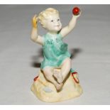 'Sunshine Days'. Modelled by F.G. Doughty. Royal Worcester figure of a girl on a beach holding a