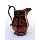 Cricket jug. A shiny brown mid 19th century Staffordshire salt-glaze jug, the hexagonal bulbous body