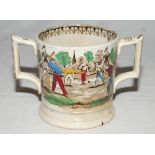 'Village cricket'. A Victorian Staffordshire loving cup, printed in black/brown with two different