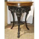 W.G. Grace. Original cast iron circular public house table with circular wooden top, supported by