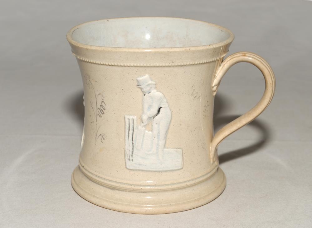 Staffordshire 4” waisted cricket mug with strap handle and beaded rim, with cream background and
