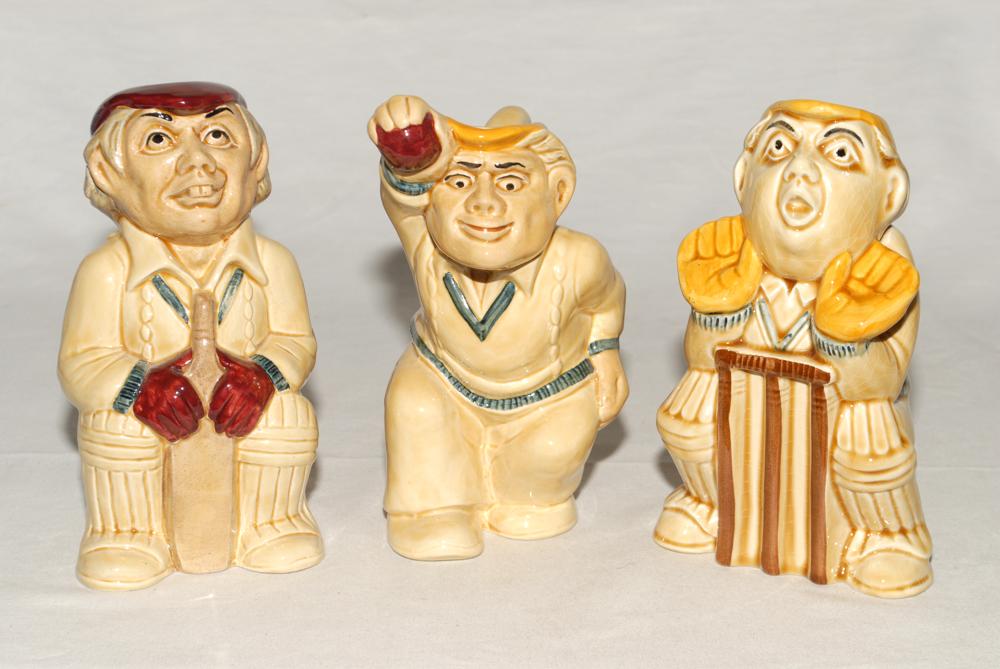 The Bowler, the Batsman and the Wicketkeeper’. Set of three H.J. Wood ceramic toby jugs of