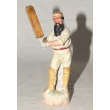 W.G. Grace. Continental, probably German, bisque figure of W.G. Grace in batting pose wearing pads