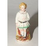 Staffordshire figure. Original Staffordshire 19th century pottery figure of a child holding a