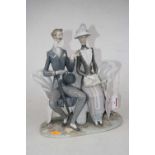 A Lladro porcelain figure group of a couple seated on a bench, height 29cmCondition report: Couple