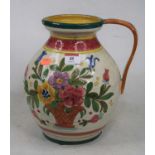 A 20th century continental water-jug, with incised and floral decoration, h.26cm