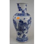 A Chinese blue and white glazed vase, of baluster form, decorated with a four-clawed dragon