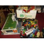 A quantity of mixed loose diecast vehicles and plastic kits, together with a wooden model garage,