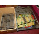 Two boxes of various 0 gauge track and lineside accessories by Hornby