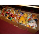 Three boxes containing a quantity of Winnie the Pooh related Disney collectables / soft plush