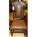 A Caroleon style joined and relief carved oak single dining chair