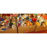 Three boxes containing a quantity of Winnie the Pooh related Disney release soft teddy-bears,