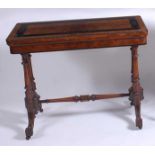 A Victorian Aesthetic Movement figured walnut and ebonised card table, the fold-over top with swivel