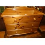 A modern pine ledgeback low chest of three long drawers, w.82cm