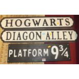 Three contemporary painted wall signs, titled Diagon Alley, Hogwarts, and Platform 9¾