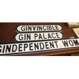 Three contemporary wall signs, entitled Gindependent Woman, Gin Palace, and Ginvincible