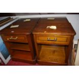 A set of four reproduction hardwood single drawer bedside cupboards