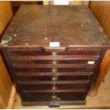 An early 20th century mahogany table-top collectors chest, of six long graduated drawers and flush