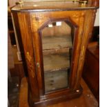 A Victorian stained walnut and floral inlaid single door glazed music cabinet, w.53cm