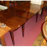 A 19th century mahogany D-end extending dining table, with central section and two additional drop-