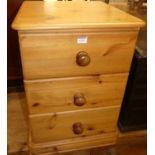 A pine three drawer bedside chest, w.44cm