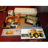 A collection of mixed tinplate and diecast vehicles to include Dinky Toys, Britains and others,