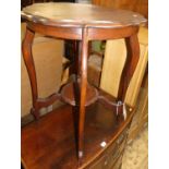 An Edwardian walnut shaped topped two-tier occasional table, dia.58cm