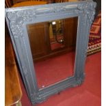 A contemporary blue painted floral decorated bevelled rectangular wall mirror, 121 x 89cmCondition