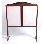 A late Victorian rosewood and silk-lined screen, having fold-out action, raised on brass feet, w.