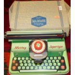 An original boxed Mettoy tinplate Supertype typewriter