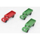 3 Dinky Toys No. 22C Motor Truck to include two in green, one with black ridged hubs - one with