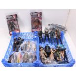 Two trays containing a quantity of modern issue action figures to include, boxed Planet of the