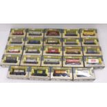 Box containing 24 Wrenn wagons including vans and tanks. (VG-E) (BVG-E)