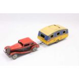 Mettoy tinplate clockwork saloon car with caravan comprising, 2 seater car finished in red and black