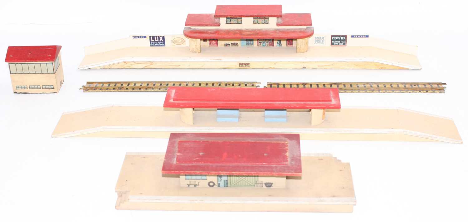 A collection of Hornby Dublo pre-war wooden buildings with red roofs: Though Station, Island