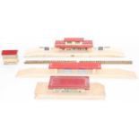 A collection of Hornby Dublo pre-war wooden buildings with red roofs: Though Station, Island