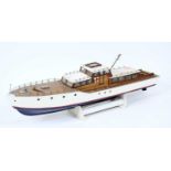A scratch built wooden and balsawood model of a 1940s/1950s river cruiser, comprising white, blue