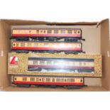 Four Lima 0 gauge bogie coaches: 2 x BR red & cream 1st/2nd 152118 and two br/2nd 34100 (one BE) All