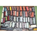 Large tray containing approx. 120 x 4-wheel goods wagons, unboxed. Variety of styles and makes.