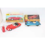 2 boxed vintage models to include, Mettoy tinplate friction drive "Banshee Racer" in blue and a