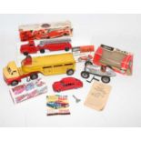A mixed tray containing Mettoy tinplate and plastic car transporter, Schuco Studio 1050 clockwork