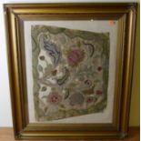 A Regency crewelwork panel, on later fabric background, 42 x 56cm, the whole within a gilt